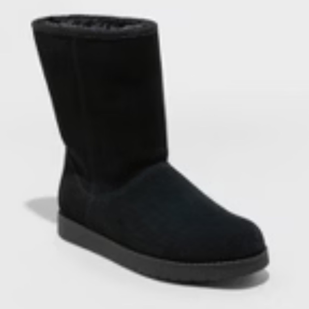 Warm, fleece-lined UGG-style black boots.